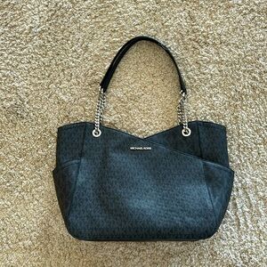 Michael Kors black purse.